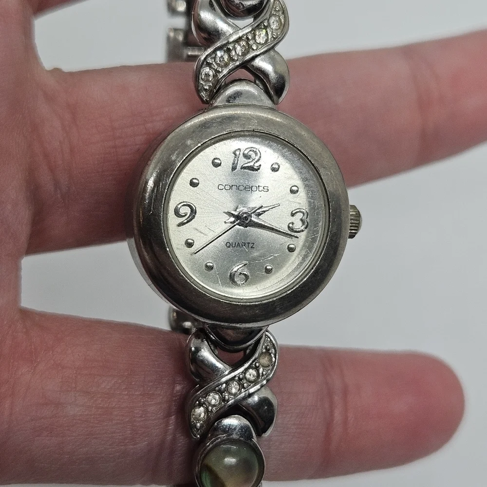 Concepts in Time silver tone watch skinny band with faux abalone and rhinestones